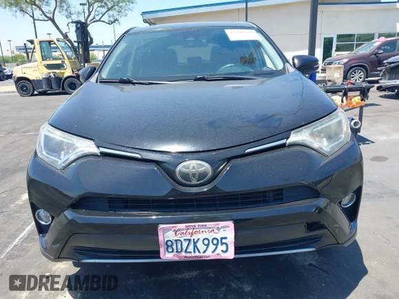 2018 Toyota RAV4 XLE z VIN 2T3WFREV1JW450514, wystawiony jako IAAI lot #42291018 z przebiegiem 89 370 mil mil oraz . Historia ofert i sprzedaży dostępna na DreamBid. Obrazek 13.