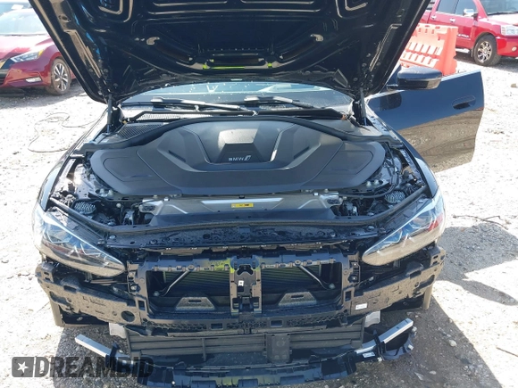 2024 BMW i4 xDrive40 z VIN WBY83FB05RFS37070, wystawiony jako IAAI lot #41975207 z przebiegiem 8 304 mil mil oraz . Historia ofert i sprzedaży dostępna na DreamBid. Obrazek 10.