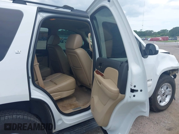 2007 Chevrolet Tahoe LTZ with VIN 1GNFC13J47J336516, listed as a IAAI auction lot 42545424 with 211,669 mi miles and . Bid and sale history available at DreamBid. Image 8.