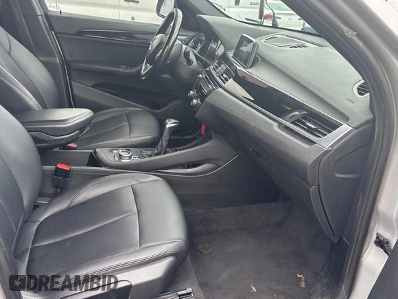 2018 BMW X1 sDrive28i with VIN WBXHU7C38J5L08773, listed as a Copart auction lot 55470955 with 149,885 mi miles and Clean Title. Bid and sale history available at DreamBid. Image 5.