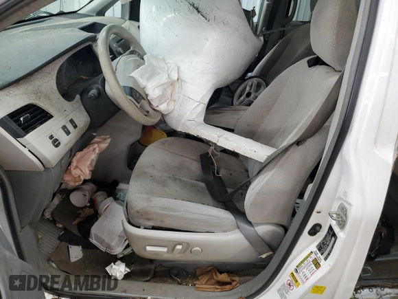 2012 Toyota Sienna LE AAS с VIN 5TDKK3DC1CS269618, выставлен на аукционе Copart как лот 49789095 с пробегом Не указан миль и Списание • Salvage title. История ставок и продаж доступна на DreamBid. Изображение 7.