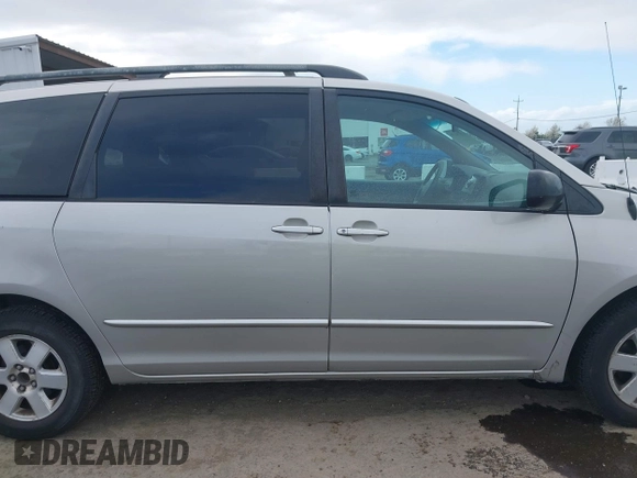 2005 Toyota Sienna CE with VIN 5TDZA23C55S264700, listed as a IAAI auction lot 41878179 with 293,934 mi miles. Bid and sale history available at carsss.com. Image 13.