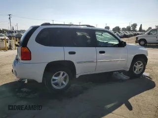 2008 GMC Envoy SLE1 with VIN 1GKDS13S182137239, listed as a Copart auction lot 69627594 with 135,160 mi miles and Salvage Title. Bid and sale history available at DreamBid. Image 3.