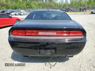 2012 Dodge Challenger SXT Plus z VIN 2C3CDYAGXCH127824, wystawiony jako Copart lot #55026435 z przebiegiem Nie podano mil oraz Szkoda całkowita • Salvage title. Historia ofert i sprzedaży dostępna na DreamBid. Obrazek 6.