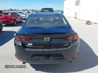 2021 Mazda 3 S z VIN JM1BPAAL4M1333238, wystawiony jako IAAI lot #40532801 z przebiegiem 33 538 mil mil oraz . Historia ofert i sprzedaży dostępna na DreamBid. Obrazek 16.