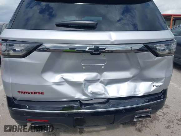 2019 Chevrolet Traverse Premier with VIN 1GNEVKKW3KJ287097, listed as a IAAI auction lot 42497740 with 72,836 mi miles and . Bid and sale history available at DreamBid. Image 6.