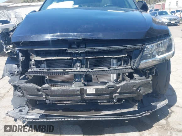 2021 Volkswagen Tiguan SE with VIN 3VV3B7AX0MM015825, listed as a IAAI auction lot 41955268 with 57,909 mi miles and . Bid and sale history available at DreamBid. Image 17.