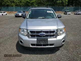 2011 Ford Escape XLS z VIN 1FMCU0C75BKA71501, wystawiony jako Copart lot #62614335 z przebiegiem 130 210 mil mil oraz Szkoda całkowita • Salvage title. Historia ofert i sprzedaży dostępna na DreamBid. Obrazek 5.