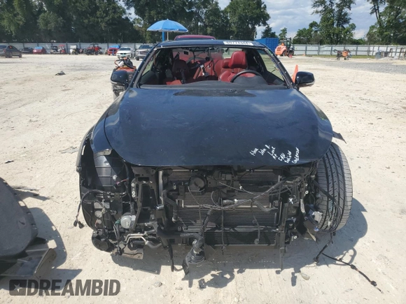 2022 Infiniti Q60 Red Sport 400 with VIN JN1FV7LL7NM680945, listed as a Copart auction lot 69774344 with 9,036 mi miles and Salvage title. Bid and sale history available at DreamBid. Image 5.