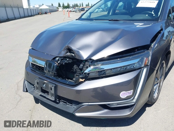 2018 Honda Clarity Touring z VIN JHMZC5F33JC021811, wystawiony jako IAAI lot #42272808 z przebiegiem 82 414 mil mil oraz . Historia ofert i sprzedaży dostępna na DreamBid. Obrazek 6.