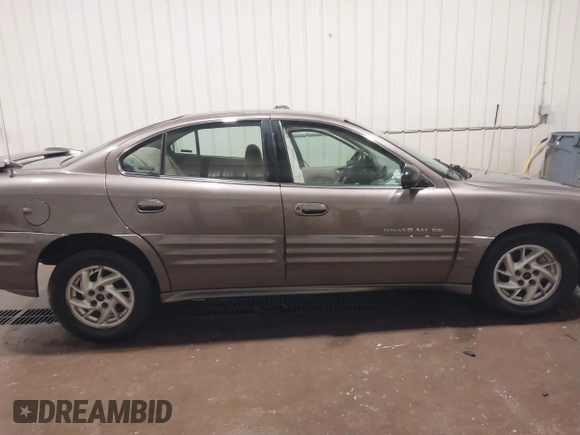 2002 Pontiac Grand Am SE1 z VIN 1G2NF52FX2C128240, wystawiony jako IAAI lot #41356415 z przebiegiem 15 900 mil mil oraz . Historia ofert i sprzedaży dostępna na DreamBid. Obrazek 13.