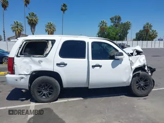 2007 Chevrolet Tahoe LT with VIN 1GNFC13027J407025, listed as a IAAI auction lot 42290155 with Not provided miles and . Bid and sale history available at DreamBid. Image 14.