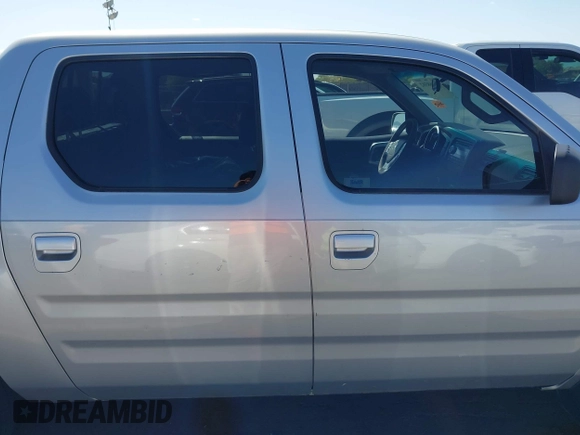 2007 Honda Ridgeline RTS z VIN 2HJYK16467H543402, wystawiony jako IAAI lot #42068582 z przebiegiem 232 067 mil mil oraz . Historia ofert i sprzedaży dostępna na DreamBid. Obrazek 13.