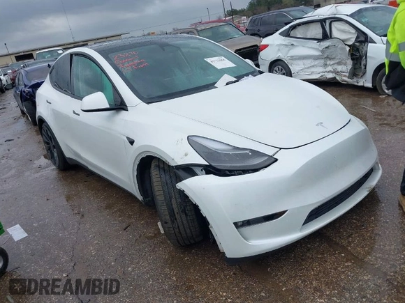 2023 Tesla Model Y Performance with VIN 7SAYGDEF7PF807312, listed as a IAAI auction lot 41711068 with 25,029 mi miles and . Bid and sale history available at DreamBid. Image 1.