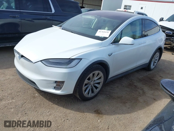 2018 Tesla Model X 75D with VIN 5YJXCBE27JF121834, listed as a IAAI auction lot 41769246 with 90,814 mi miles and . Bid and sale history available at carsss.com. Image 19.