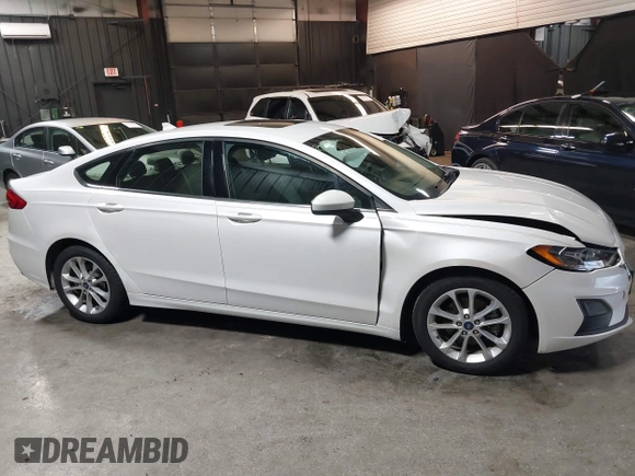 2020 Ford Fusion SE z VIN 3FA6P0LU8LR142370, wystawiony jako IAAI lot #42457342 z przebiegiem 53 808 mil mil oraz . Historia ofert i sprzedaży dostępna na DreamBid. Obrazek 13.