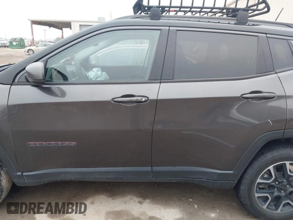 2019 Jeep Compass Trailhawk with VIN 3C4NJDDB1KT739938, listed as a IAAI auction lot 41411173 with 140,396 mi miles and . Bid and sale history available at carsss.com. Image 14.