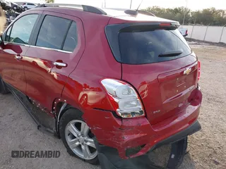 2020 Chevrolet Trax LT with VIN 3GNCJLSB3LL163220, listed as a IAAI auction lot 41630398 with 34,513 mi miles and . Bid and sale history available at DreamBid. Image 6.