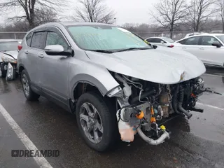 2018 Honda CR-V EX-L with VIN 7FARW2H88JE051829, listed as a IAAI auction lot 41517779 with 69,857 mi miles. Bid and sale history available at carsss.com. Image 1.