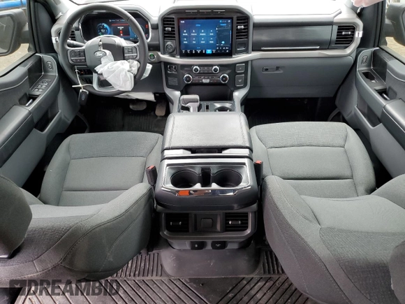 2024 Ford F-150 Lightning XLT z VIN 1FTVW3LK0RWG05326, wystawiony jako Copart lot #55842435 z przebiegiem 23 914 mil mil oraz Czysty tytuł • Clean title. Historia ofert i sprzedaży dostępna na DreamBid. Obrazek 8.