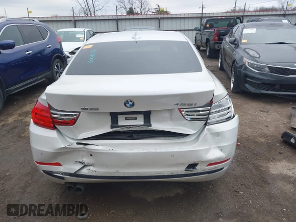 2016 BMW 4 Series 428i with VIN WBA3N7C54GK227475, listed as a IAAI auction lot 40963425 with 87,408 mi miles and . Bid and sale history available at carsss.com. Image 16.