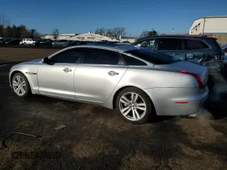 2013 Jaguar XJ Portfolio with VIN SAJWJ2GD3D8V47266, listed as a Copart auction lot 46824695 with 157,151 mi miles and Salvage title. Bid and sale history available at DreamBid. Image 2.
