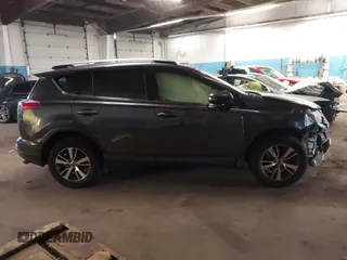 2018 Toyota RAV4 XLE with VIN JTMRFREV8JJ208377, listed as a IAAI auction lot 41629369 with 160,870 mi miles. Bid and sale history available at carsss.com. Image 13.
