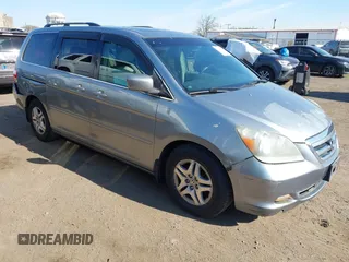 2006 Honda Odyssey EX-L with VIN 5FNRL38696B077792, listed as a IAAI auction lot 42048793 with 149,868 mi miles and . Bid and sale history available at carsss.com. Image 1.