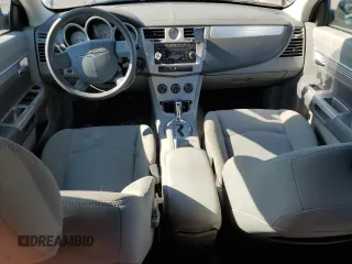 2008 Chrysler Sebring Touring z VIN 1C3LC55R38N176522, wystawiony jako Copart lot #57062395 z przebiegiem 151 843 mil mil oraz Szkoda całkowita • Salvage title. Historia ofert i sprzedaży dostępna na DreamBid. Obrazek 8.