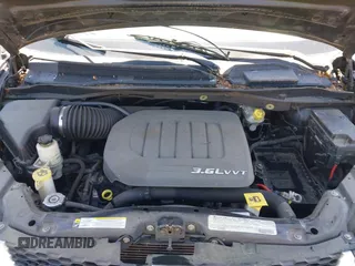 2012 Dodge Grand Caravan SXT with VIN 2C4RDGCG8CR247824, listed as a IAAI auction lot 42210397 with 200,919 mi miles and . Bid and sale history available at DreamBid. Image 10.