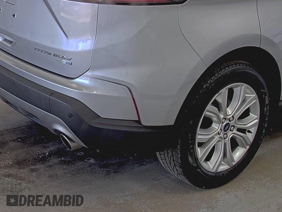 2020 Ford Edge Titanium z VIN 2FMPK4K91LBA91290, wystawiony jako IAAI lot #42494043 z przebiegiem 71 254 mil mil oraz . Historia ofert i sprzedaży dostępna na DreamBid. Obrazek 18.