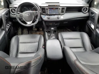 2018 Toyota RAV4 Hybrid SE with VIN JTMJJREV6JD225530, listed as a Copart auction lot 52000985 with 150,642 mi miles and Salvage title. Bid and sale history available at DreamBid. Image 8.