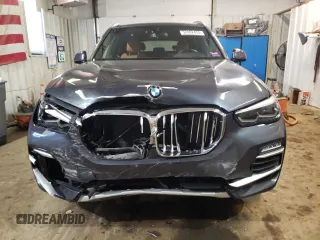 2021 BMW X5 xDrive40i with VIN 5UXCR6C06M9E05140, listed as a Copart auction lot 52402475 with 47,869 mi miles and Salvage title. Bid and sale history available at DreamBid. Image 5.