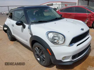 2013 MINI Paceman S ALL4 with VIN WMWSS7C51DWN51802, listed as a IAAI auction lot 41885786 with 96,386 mi miles and . Bid and sale history available at DreamBid. Image 1.