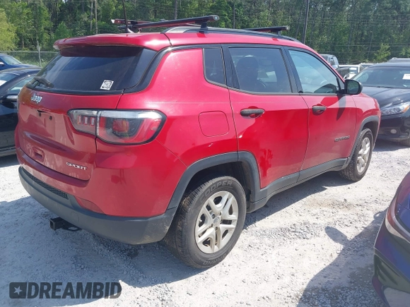 2018 Jeep Compass Sport with VIN 3C4NJCABXJT502717, listed as a IAAI auction lot 41985204 with 124,900 mi miles and . Bid and sale history available at DreamBid. Image 4.