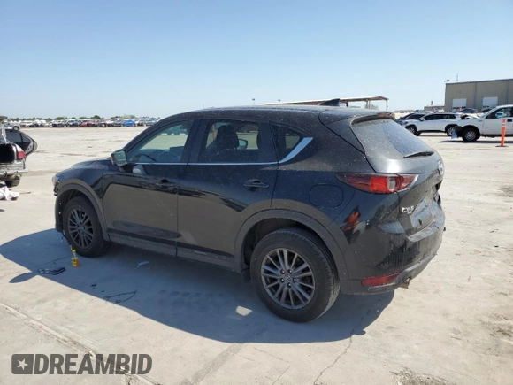 2021 Mazda CX-5 Touring z VIN JM3KFBCM8M0321766, wystawiony jako Copart lot #52845085 z przebiegiem 115 627 mil mil oraz Szkody całkowita. Historia ofert i sprzedaży dostępna na DreamBid. Obrazek 2.