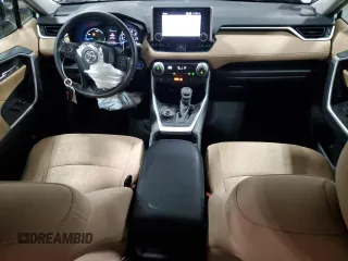 2019 Toyota RAV4 Hybrid XLE with VIN 2T3RWRFV1KW016526, listed as a Copart auction lot 61466435 with 64,255 mi miles and Salvage title. Bid and sale history available at DreamBid. Image 8.