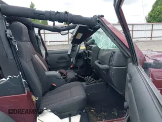 2003 Jeep Wrangler X z VIN 1J4FA39S73P349014, wystawiony jako IAAI lot #42582747 z przebiegiem 50 525 mil mil oraz . Historia ofert i sprzedaży dostępna na DreamBid. Obrazek 5.