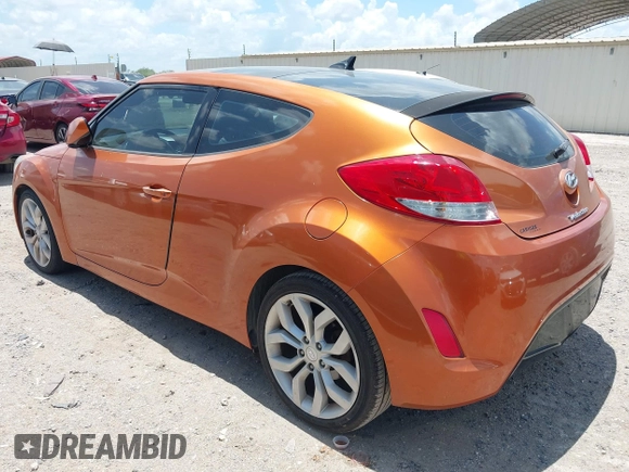 2013 Hyundai Veloster w/Black Int with VIN KMHTC6AD0DU147017, listed as a IAAI auction lot 42707858 with 115,130 mi miles and . Bid and sale history available at DreamBid. Image 3.