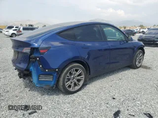 2024 Tesla Model Y z VIN 7SAYGDED3RF006264, wystawiony jako Copart lot #55210365 z przebiegiem 19 394 mil mil oraz Szkoda całkowita • Salvage title. Historia ofert i sprzedaży dostępna na DreamBid. Obrazek 3.