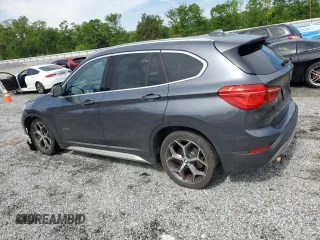 2016 BMW X1 xDrive28i z VIN WBXHT3C37GP888364, wystawiony jako Copart lot #53644975 z przebiegiem 119 725 mil mil oraz Szkoda całkowita • Salvage title. Historia ofert i sprzedaży dostępna na DreamBid. Obrazek 2.