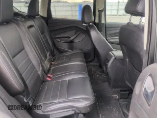 2014 Ford Escape Titanium with VIN 1FMCU9J97EUB30467, listed as a Copart auction lot 54949035 with 112,013 mi miles and Salvage Title. Bid and sale history available at DreamBid. Image 11.