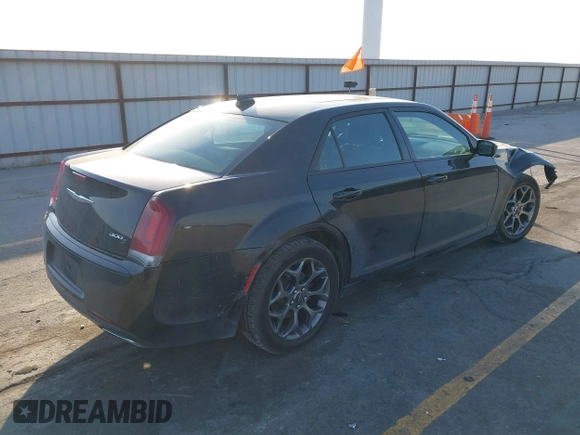 2015 Chrysler 300 with VIN 2C3CCAGG8FH808618, listed as a IAAI auction lot 41695711 with 137,050 mi miles. Bid and sale history available at carsss.com. Image 4.