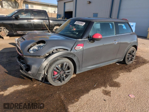 2016 MINI Hardtop John Cooper Works with VIN WMWXM9C50GT997764, listed as a Copart auction lot 52826365 with 82,430 mi miles and Salvage title. Bid and sale history available at DreamBid. Image 1.