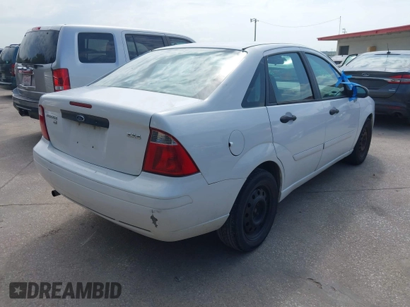 2005 Ford Focus S with VIN 1FAFP34N85W245314, listed as a IAAI auction lot 42680320 with 249,306 mi miles and . Bid and sale history available at DreamBid. Image 4.