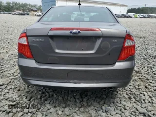 2012 Ford Fusion SE with VIN 3FAHP0HA0CR355529, listed as a Copart auction lot 62585515 with 113,094 mi miles and Salvage title. Bid and sale history available at DreamBid. Image 6.