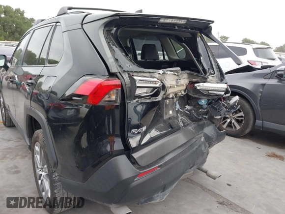 2022 Toyota RAV4 XLE Premium with VIN JTMC1RFV0ND085813, listed as a IAAI auction lot 42152401 with 86,707 mi miles and . Bid and sale history available at DreamBid. Image 6.