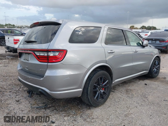 2018 Dodge Durango SRT with VIN 1C4SDJGJ5JC256006, listed as a IAAI auction lot 41038356 with 71,385 mi miles and . Bid and sale history available at DreamBid. Image 4.