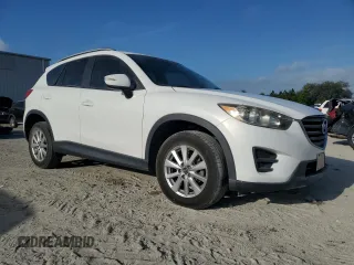2016 Mazda CX-5 Sport with VIN JM3KE2BY9G0743167, listed as a Copart auction lot 51309175 with 84,192 mi miles and Clean Title. Bid and sale history available at carsss.com. Image 4.