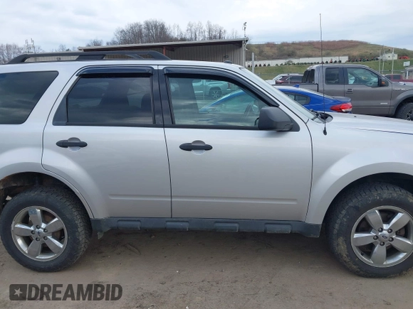 2012 Ford Escape XLT with VIN 1FMCU9DG1CKB76704, listed as a IAAI auction lot 41863525 with 176,104 mi miles and . Bid and sale history available at DreamBid. Image 13.